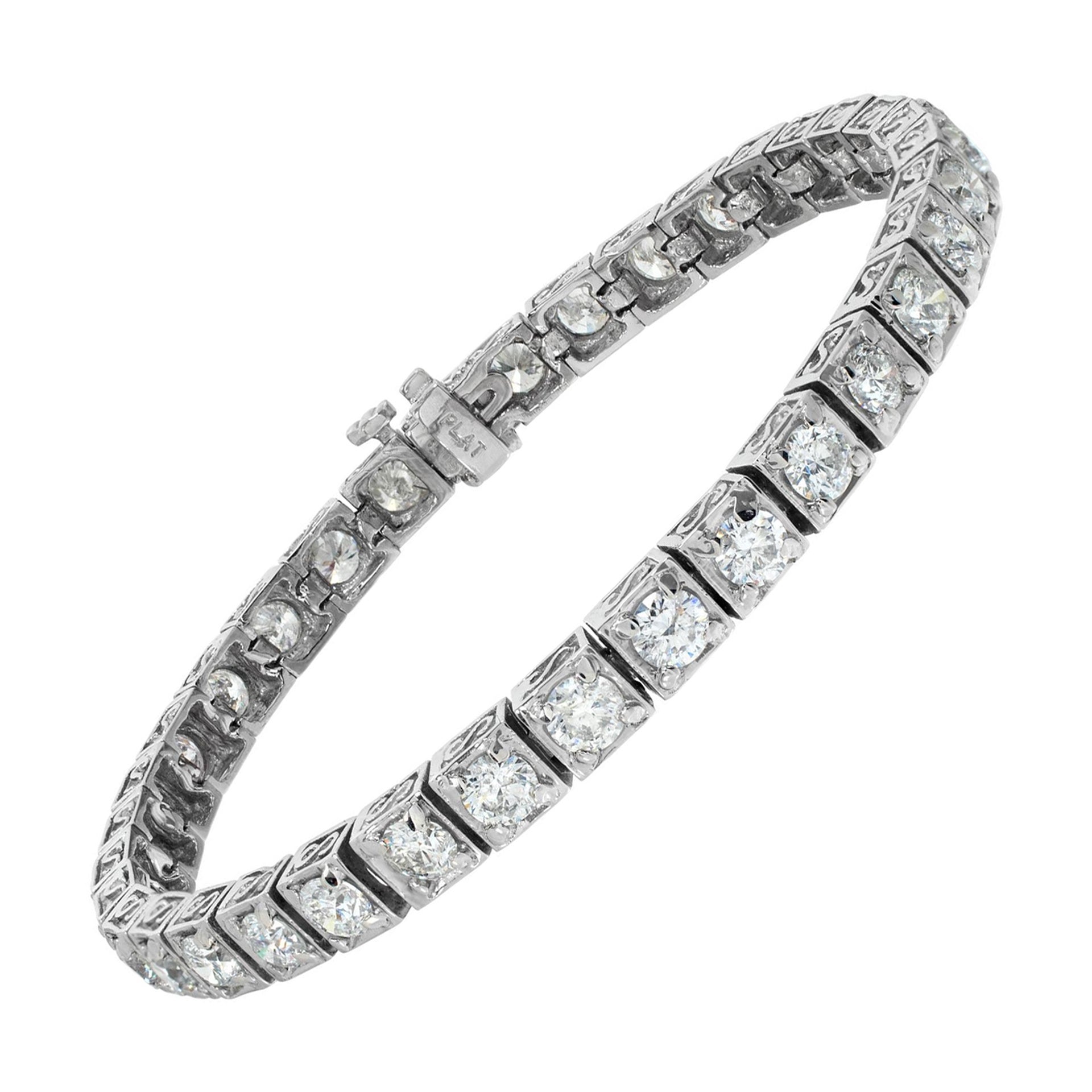 Platinum diamond bracelet w/ round brilliant cut diamonds set in 4 prong setting For Sale
