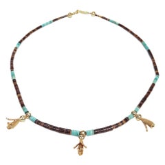 Collana Southwestern in oro 14k con turchese e agata e fiori di zucca in perline