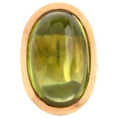 Large 38.24 carat Peridot Oval Cabochon Gold Ring