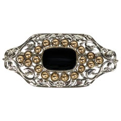 Unusual Arts and Crafts Platinum, Gold and Onyx Brooch, F.G. Hale