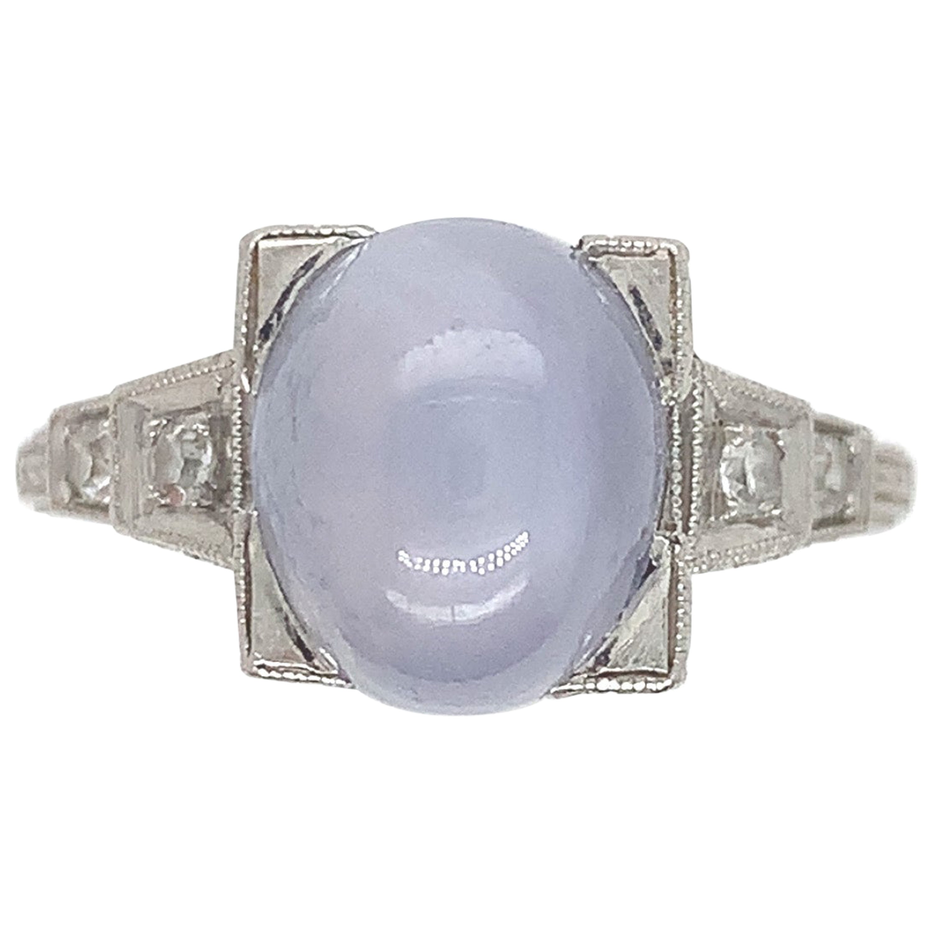 Platinum Hand Engraved Star Sapphire and Diamond Ring For Sale