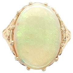 Bague en or jaune 14 carats avec opale australienne de 5,86 carats