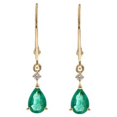 Orecchino in oro giallo 14K con diamanti smeraldo taglio pera da 0,72 carati