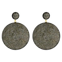 Boucle d'oreille disque pavé de diamants