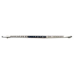 Diamonds Sapphires 1930 Vintage Brooch 18 KT Gold Platinum Sapphire Diamond