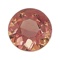 Used AIGS Certified 0.46 Carats Brownish Orange Sapphire