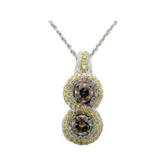 Pendentif couture avec diamants chocolat et vanille sertis en or bicolore 18 carats