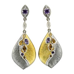 Boucles d'oreilles composées d'améthyste raisin, de citrine cannelle et de diamants vanille sertis en SLV