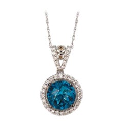 Pendant featuring Blue Topaz Chocolate & Vanilla Diamond set in 14K Vanilla Gold