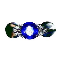Grand Sample Sale Ring featuring Cornflower Sapphire set in 14K Vanilla Gold