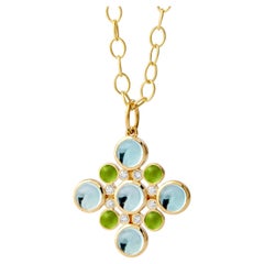 Pendentif Syna en or jaune, péridot et topaze bleue avec diamants