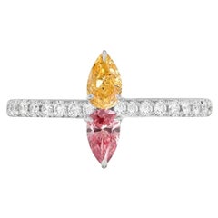 Anillo Cruzado de Oro de 18 K con Diamantes Rosa Intenso y Naranja de Fantasía
