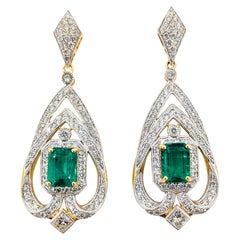 2.83ctw Emerald & Diamond Dangle Earrings 18kt