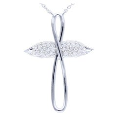 Diamants 0,1 carat en or blanc 14 carats  Collier croix papillon