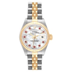 Rolex Montre Datejust en acier, or jaune, nacre, rubis et cadran pour femmes 79173