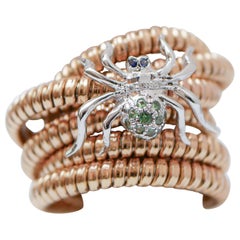 Retro Tsavorite, Sapphires, Diamonds, 14 Karat Rose Gold and White Gold Tubogas Ring