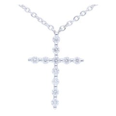 Collier croix en or blanc 14 carats et diamants 0,1 carat 