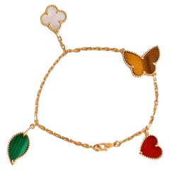 Van Cleef & Arpels Bracelet Lucky Alhambra en or jaune à 4 motifs