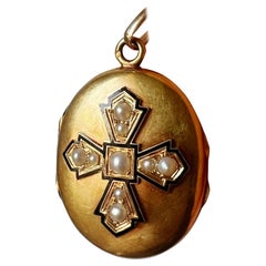 Antique Victorian 18K gold black enamel pearl locket pendant