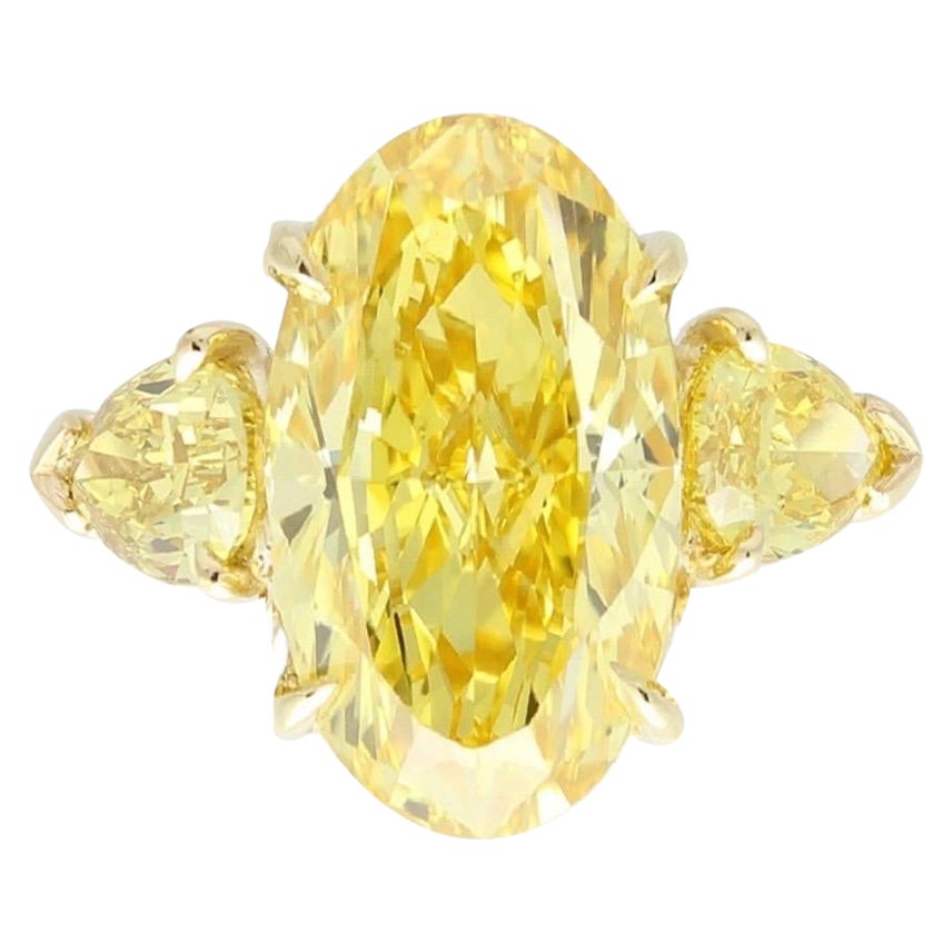 A MORCHA 4ct Yellow Oval Diamond Ring set with yellow Pear Diamonds  For Sale