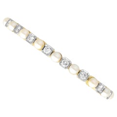 1930s Pearl and 3.30 Carat Diamond 14k Yellow Gold Line Bracelet