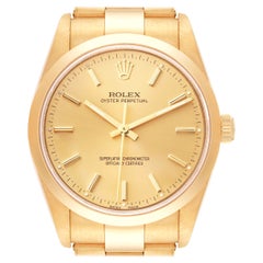 Rolex Oyster Perpetual Champagne Dial Yellow Gold Mens Watch 14208