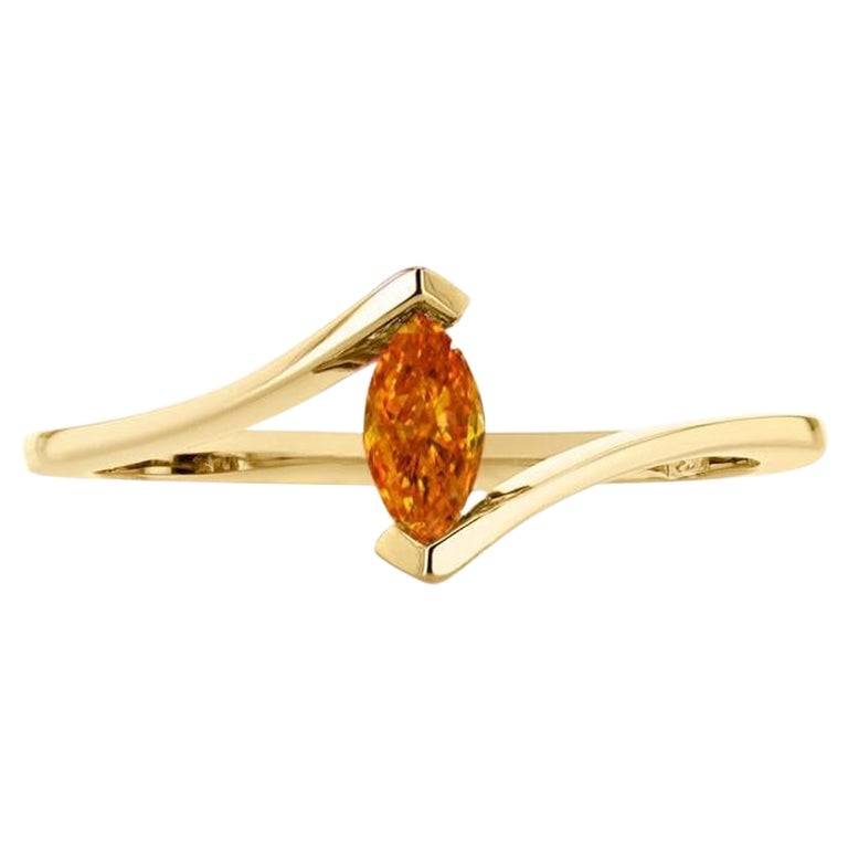 0,19 quilates Diamante de fantasía naranja amarillento vivo talla marquesa Anillo de oro de 18 quilates