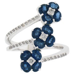 18K White Gold 1.70ctw Royal Blue Sapphire & Diamond 3 Flowers Long Bypass Ring