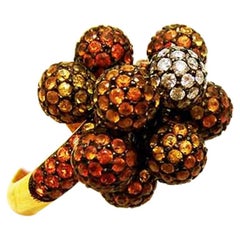 Mehrfarbiger Kugelring mit gelbem, orangefarbenem Saphir und Diamant