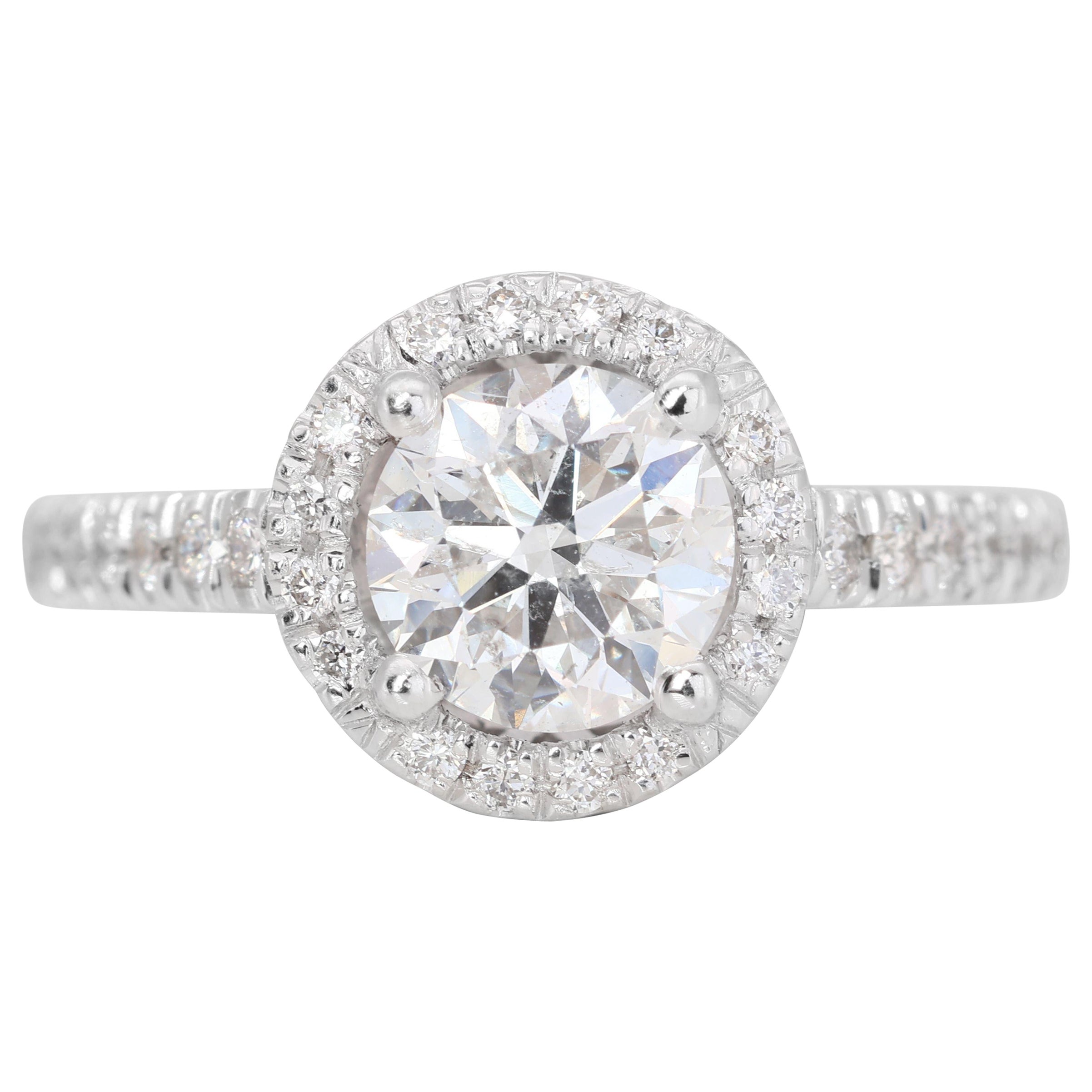 Dazzling 0.70ct Pave Halo Diamond Ring set in 14K White Gold For Sale