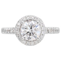 Dazzling 0.70ct Pave Halo Diamond Ring set in 14K White Gold