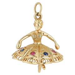 Amuleto de bailarina vintage grande de oro de 14k con zafiros rosas y azules