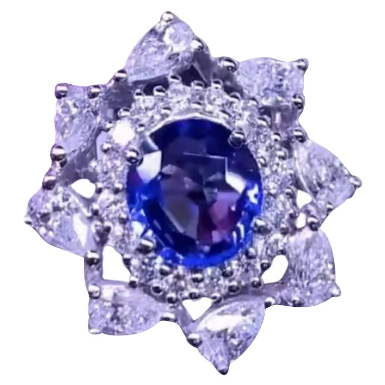 AIG Certified 3.05 Carats Ceylon Sapphire.  2.82 Ct Diamonds 18k Gold Ring