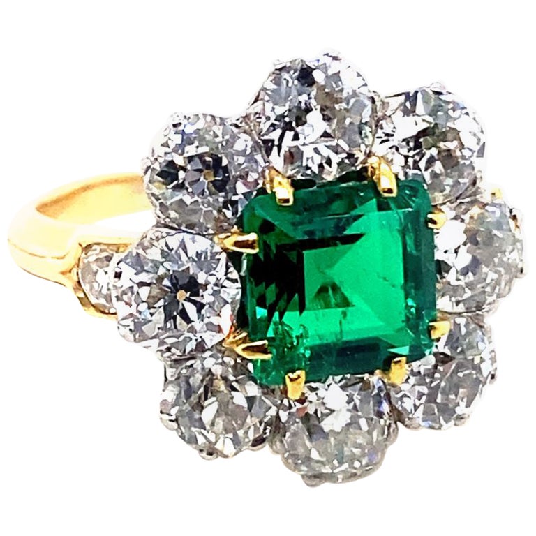 Vintage Emerald and Diamond Cluster 18 Karat Yellow Gold Engagement Ring For Sale