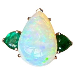 11.36 Carat Pear Shape Opal and Emerald Three Stone Cocktail Ring
