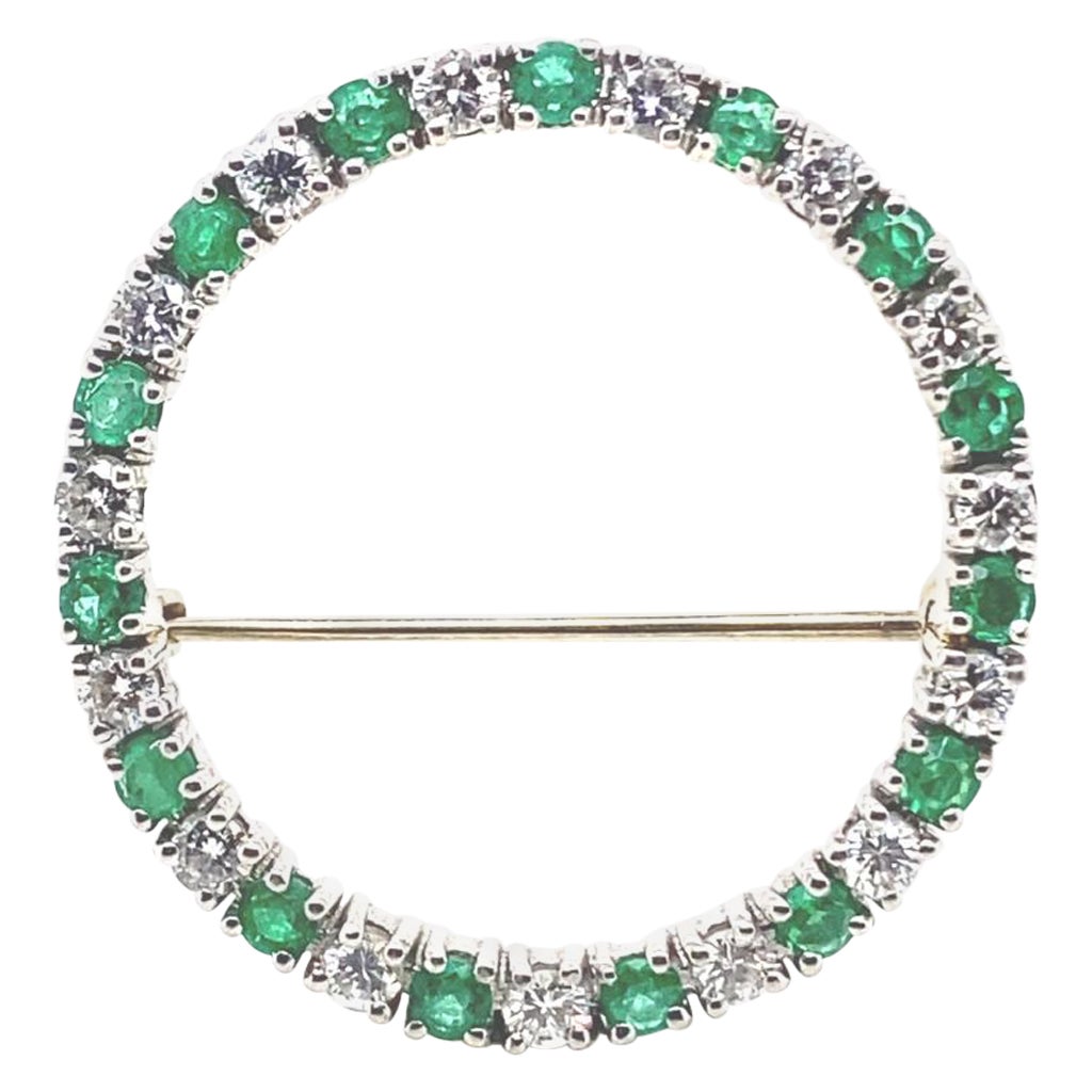 Vintage Cartier Emerald and Diamond Platinum Brooch, Circa 1960. For Sale