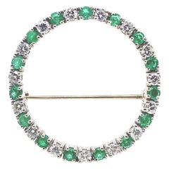 Retro Cartier Emerald and Diamond Platinum Brooch, Circa 1960.