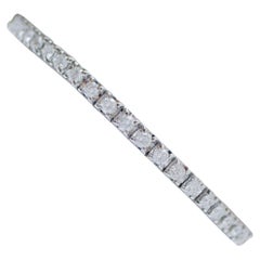 Diamonds, 14 Karat White Gold Tennis Bracelet.