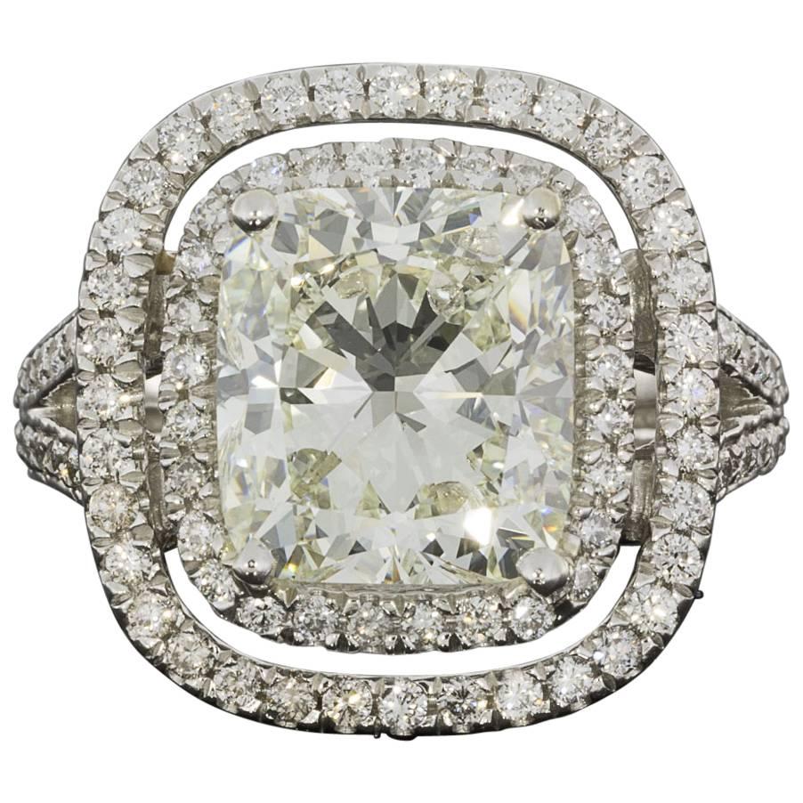 Spectacular Platinum 6.41 Carats Cushion Diamond GIA Cert Halo Engagement Ring For Sale