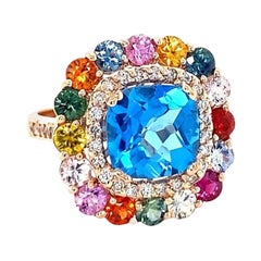 Bague de cocktail en or rose 7,74 carats Topaze bleue taille coussin Saphir Diamant