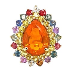 Anello da cocktail in oro giallo con zaffiro e opale di fuoco naturale da 7,11 carati con taglio a pera