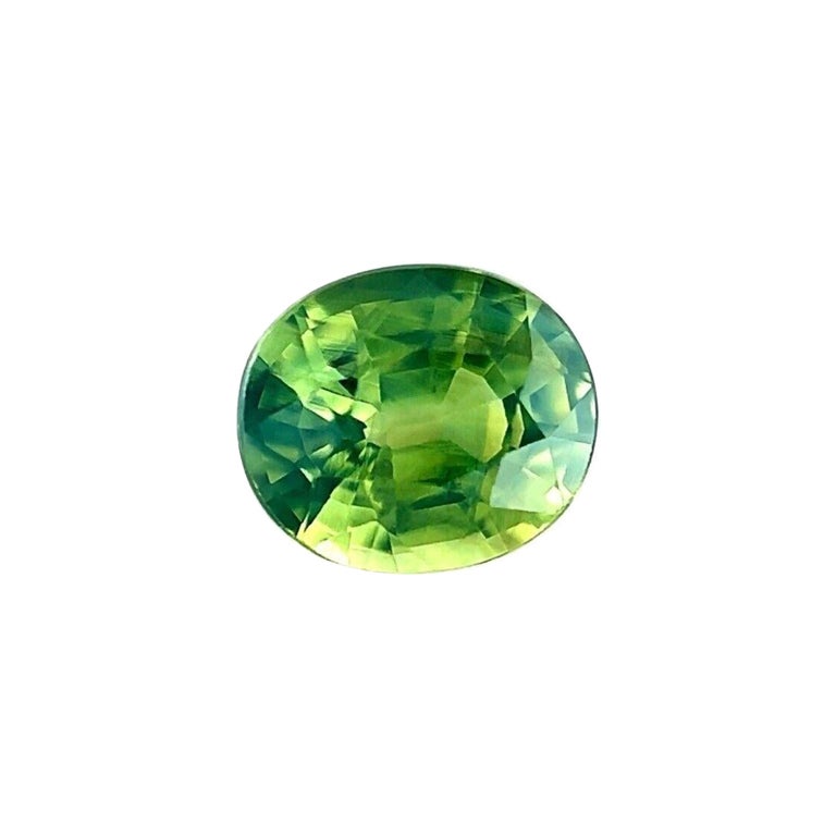 GIA Certified Vivid Yellow Green Sapphire 0.90Ct Natural Oval Cut Unheated Rare  For Sale