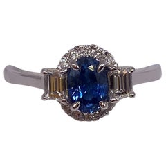 1.07ctw Oval Sapphire & Trapezoid Diamond Ring in 18KT White Gold