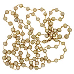 Collier long en or jaune 18 carats avec perles des mers du Sud AAA dorées