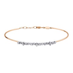 Bracelet jonc en or rose avec grappe de diamants 0,53 carat