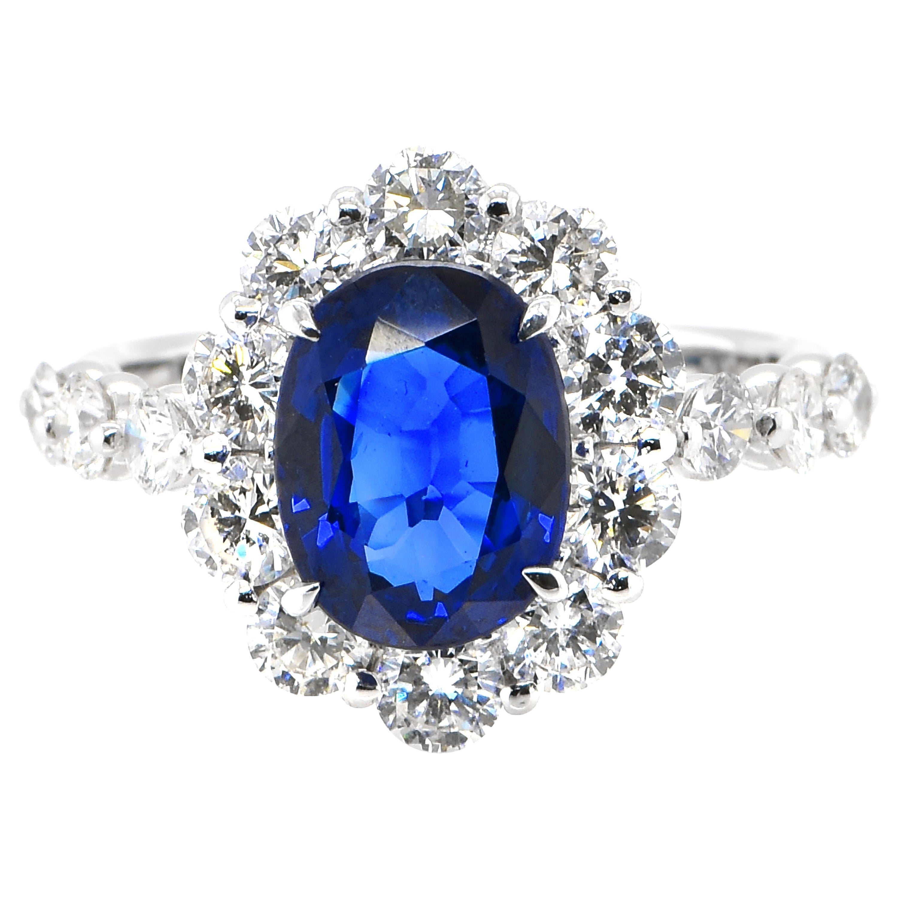 2.95 Carat Natural Royal Blue Sapphire and Diamond Halo Ring Made in Platinum