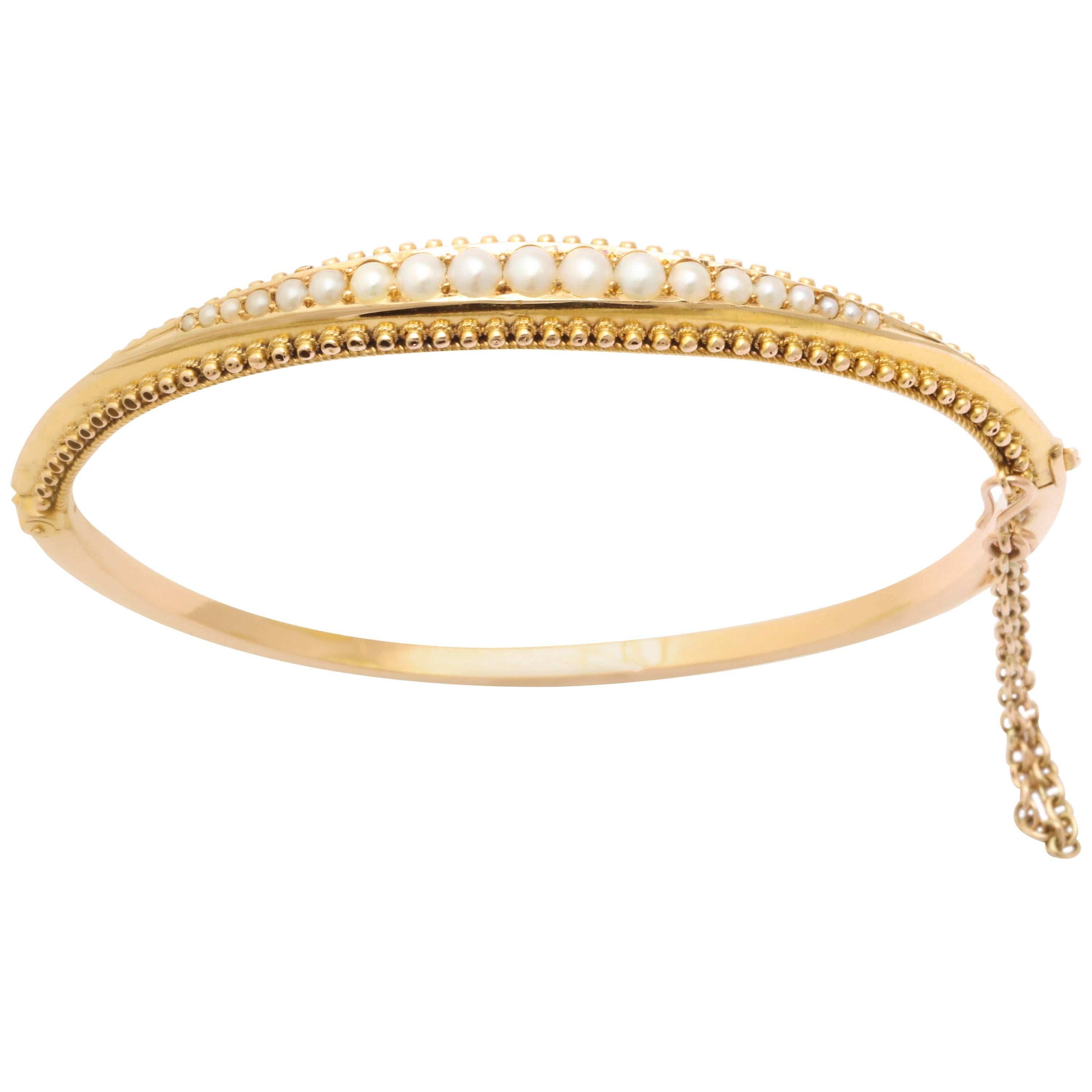 An Edwardian Gold Natural Pearl Bracelet