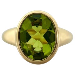 Vintage Rare Bvlgari Green Peridot Oval 18k Yellow Gold Signet Style Bezel Rubover Ring