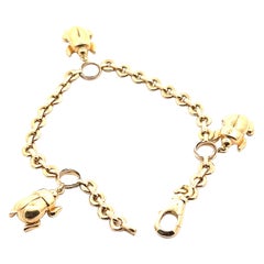 Cartier 18k yellow Gold Trinity Charm Bracelet 