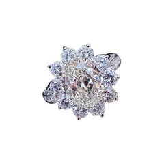 Bague en platine avec diamant ovale naturel de 2,72 carats et halo de diamants